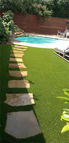 Clean residential yard after Scoop le Poop service with pool in background